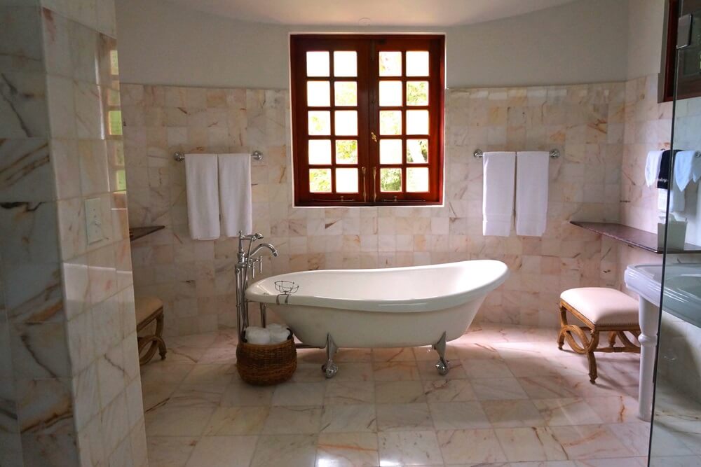 bathroom with bathtub in centre - JHB Renovators